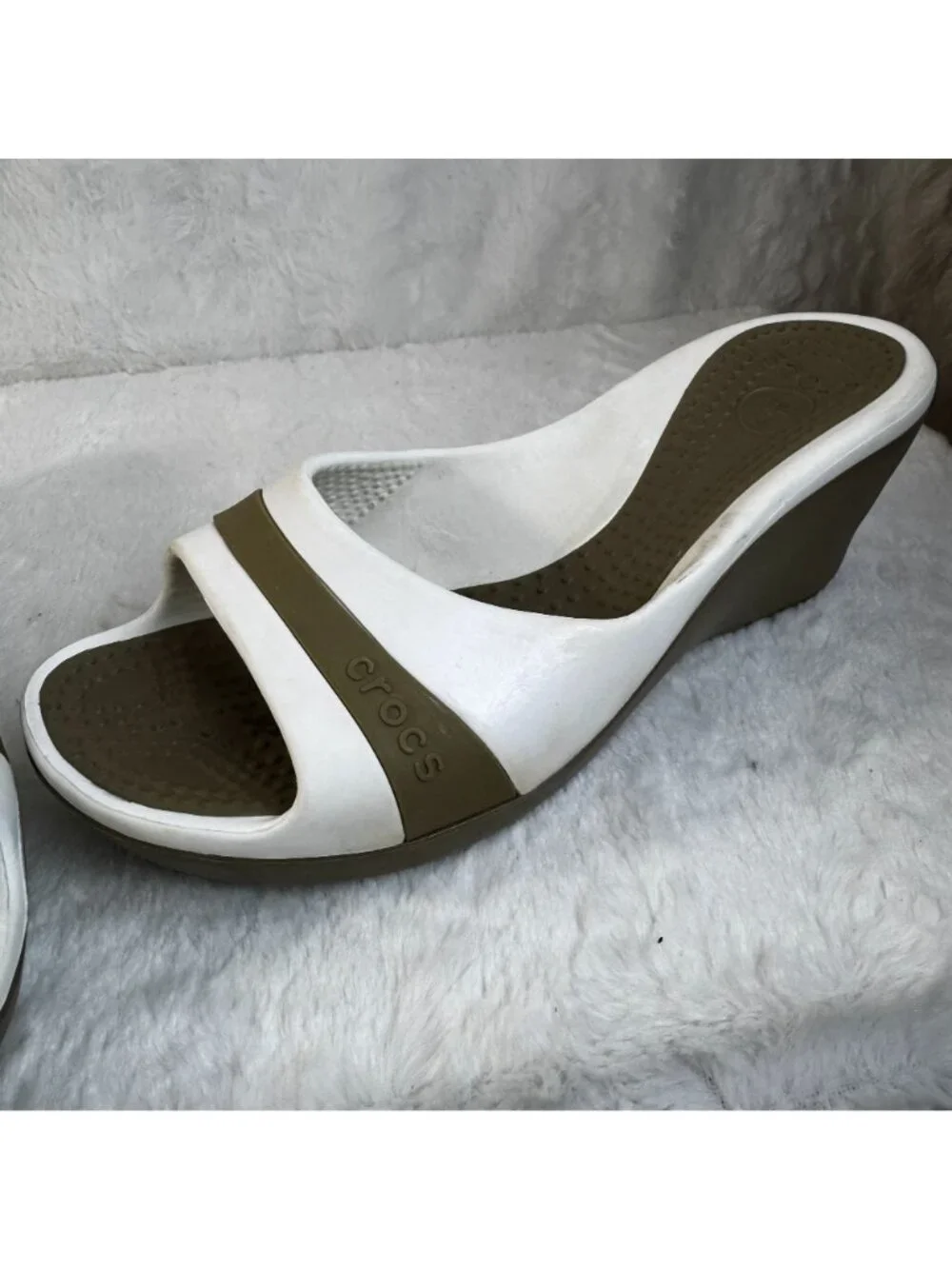 CROCS step into
